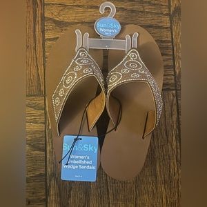 Woman’s embellished wedge sandals